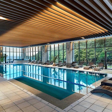 Parnas Hotel Jeju Seogwipo Exterior photo The swimming pool at the hotel