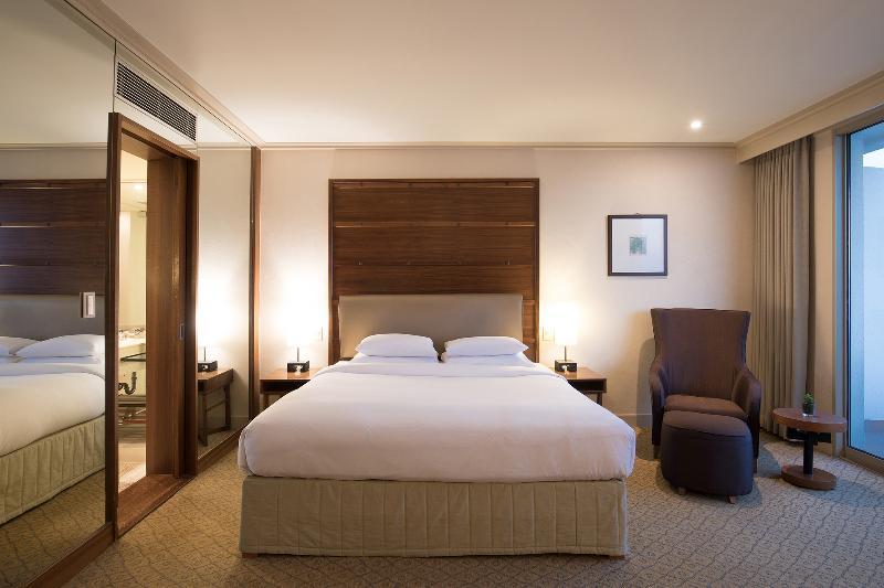 Parnas Hotel Jeju Seogwipo Exterior photo A bedroom at the Conrad London St. George's Wharf