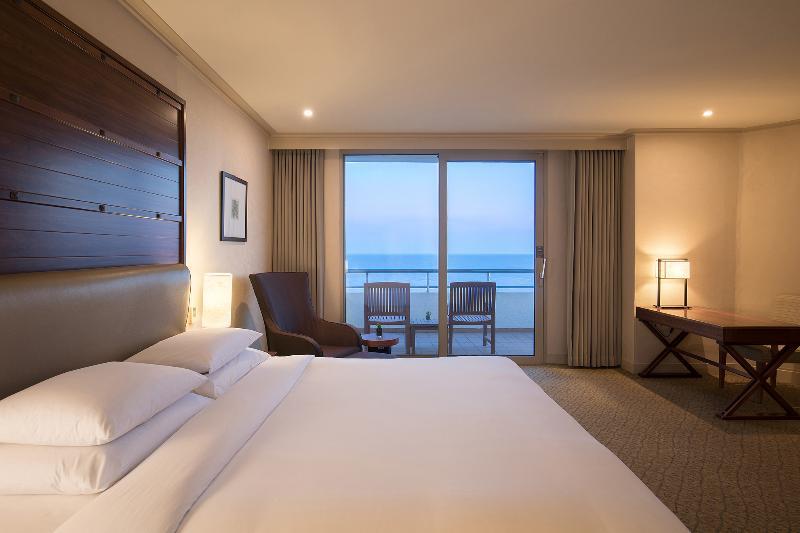 Parnas Hotel Jeju Seogwipo Exterior photo A guest room at the Hilton Sydney